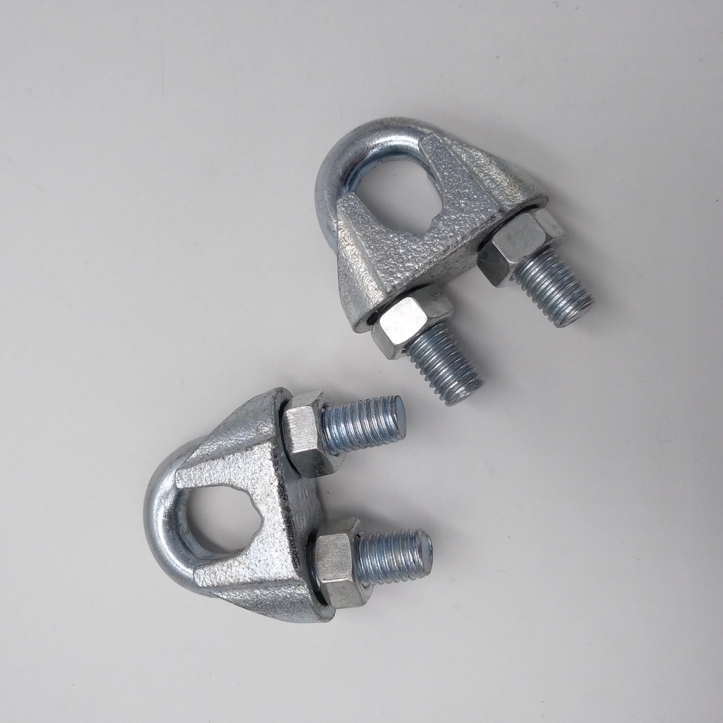 batting cage cable clamps